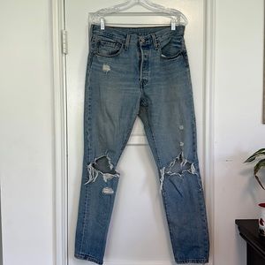Levi’s 501’s with some holes